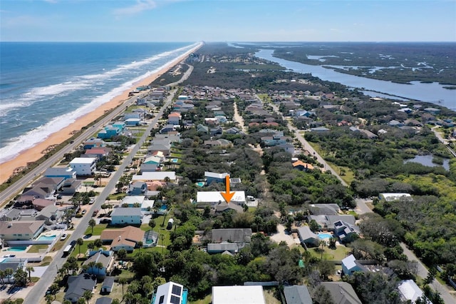 aerial view with a beach view and a water view