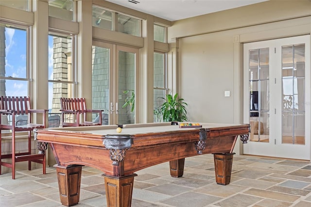 game room with french doors and billiards