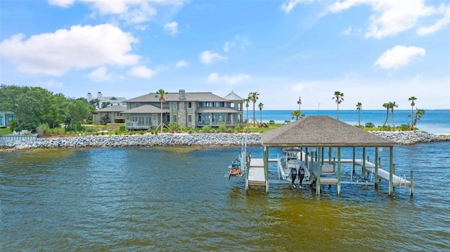 dock area with a water view