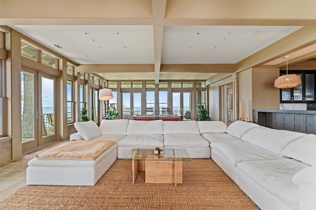 living room with beamed ceiling and coffered ceiling