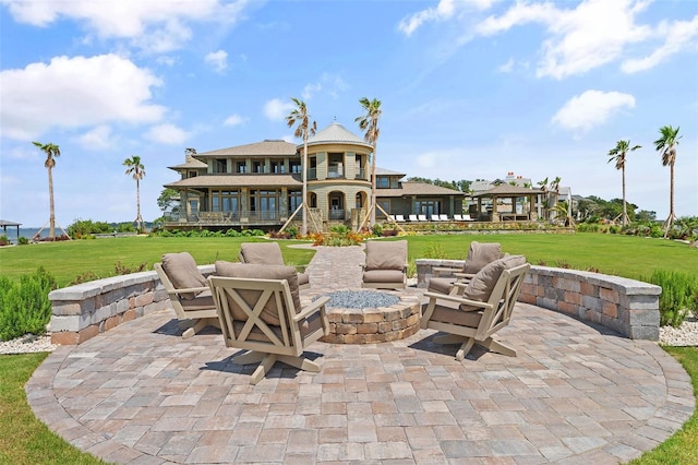 view of patio with an outdoor fire pit