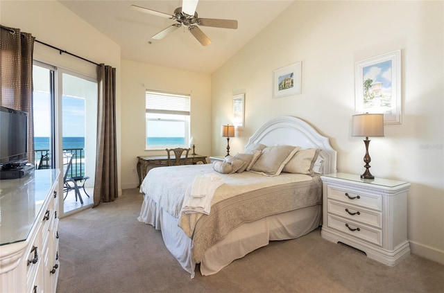 carpeted bedroom featuring lofted ceiling, multiple windows, ceiling fan, and access to outside