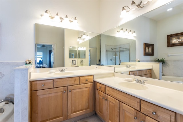 bathroom featuring vanity and plus walk in shower