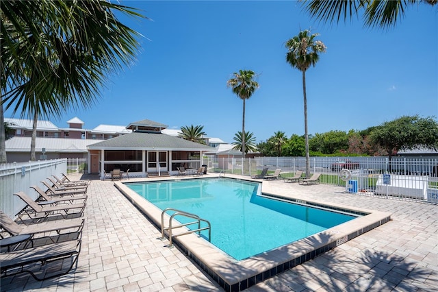 view of swimming pool featuring a patio