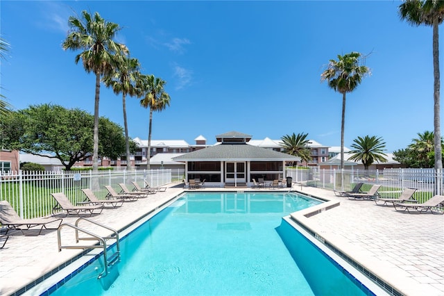 view of swimming pool with a patio area