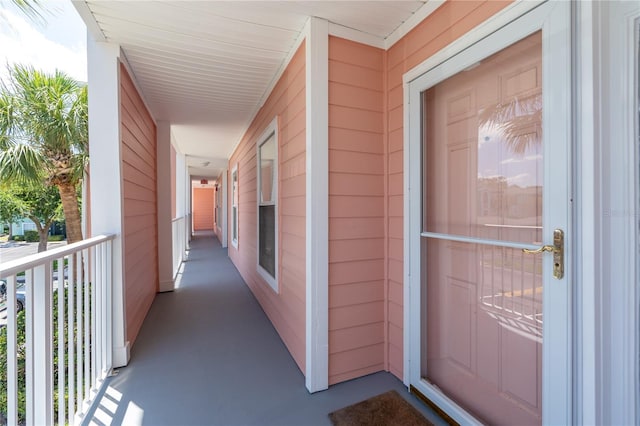 view of exterior entry featuring a porch