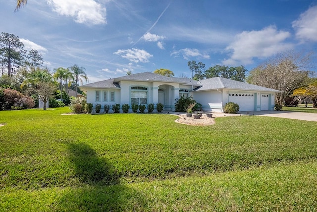 ranch-style home featuring a garage and a front lawn