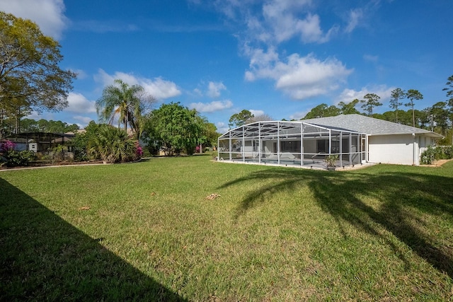 view of yard featuring a lanai