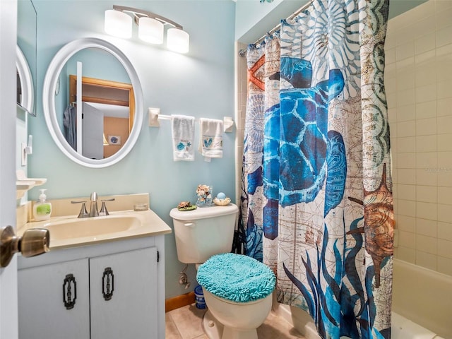 full bathroom with vanity, tile floors, toilet, and shower / bathtub combination with curtain