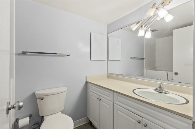 bathroom with oversized vanity and toilet