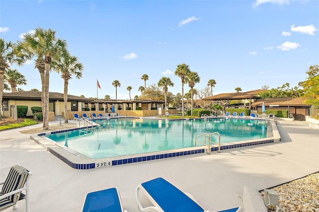 view of swimming pool featuring a patio area