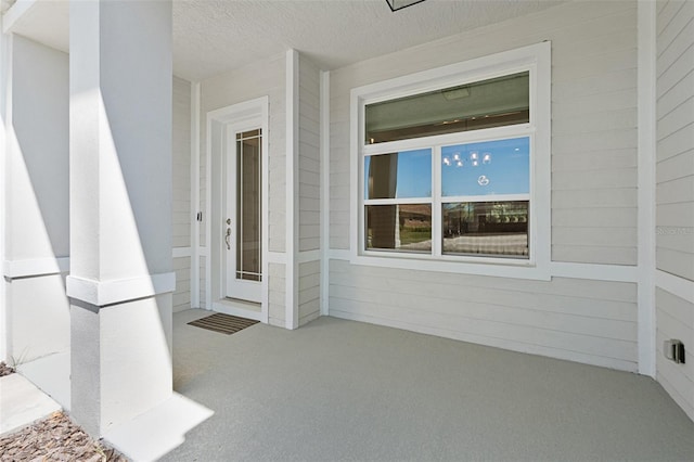 interior space with a textured ceiling