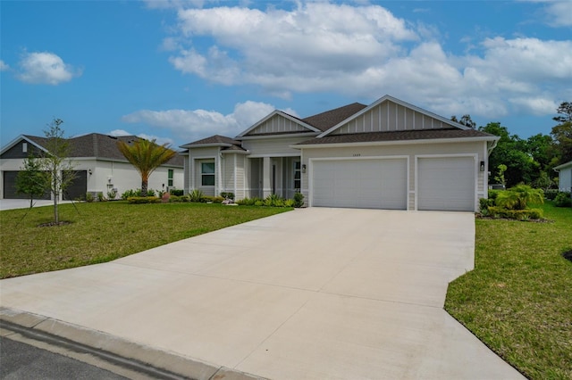 view of front facade with a front yard and a garage