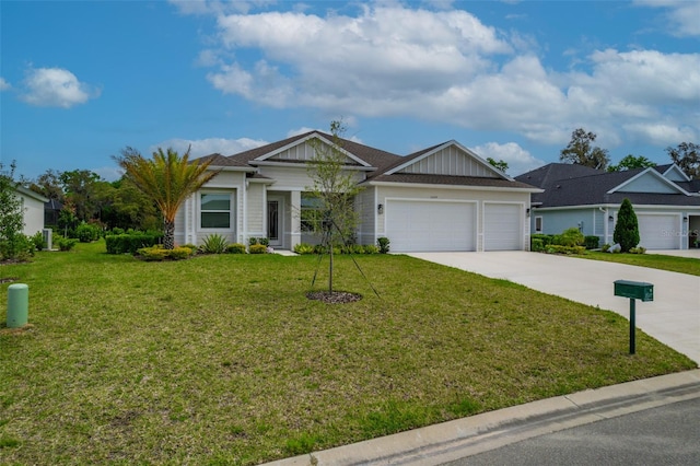 single story home with a front yard and a garage