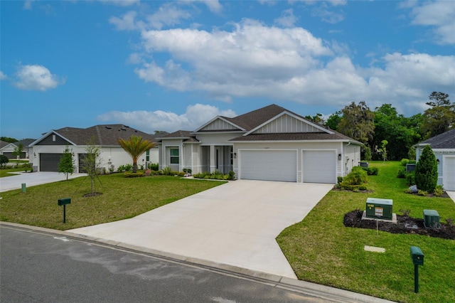 view of front of house with a front lawn and a garage