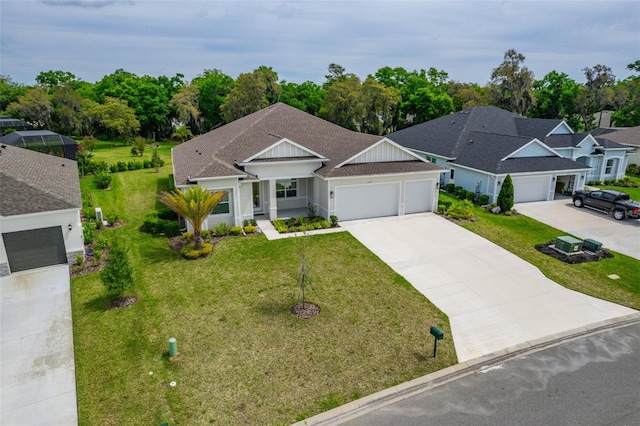 ranch-style home featuring a front lawn and a garage