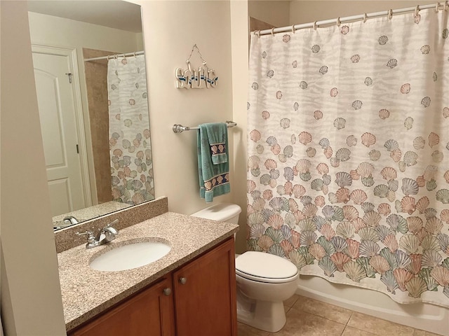 full bathroom with shower / tub combo with curtain, vanity, toilet, and tile patterned flooring