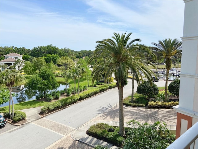 surrounding community featuring a water view