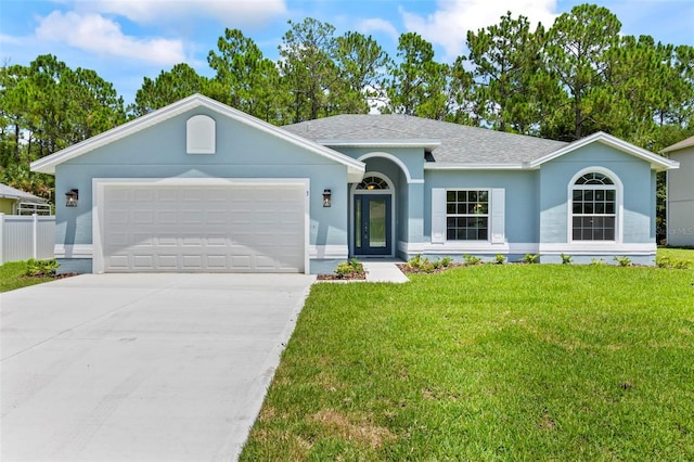 ranch-style house with a front lawn and a garage