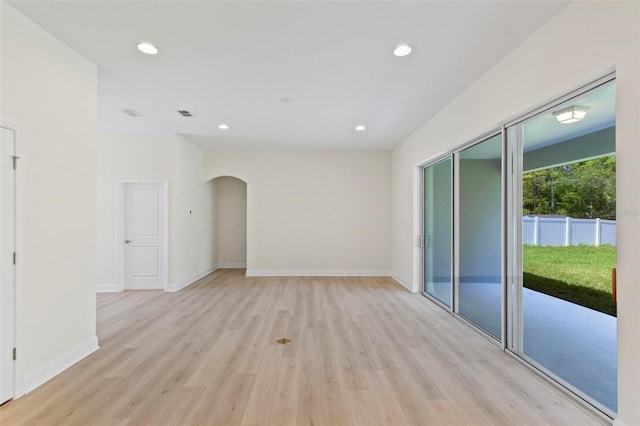 empty room with light wood-type flooring