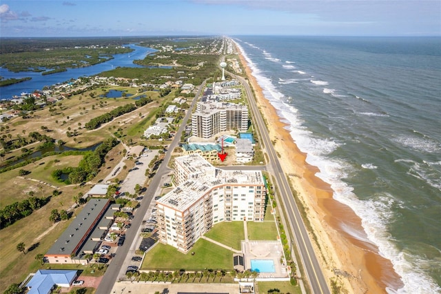 aerial view with a beach view and a water view