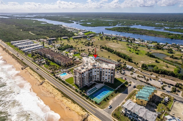 aerial view featuring a beach view and a water view