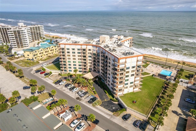 drone / aerial view with a water view