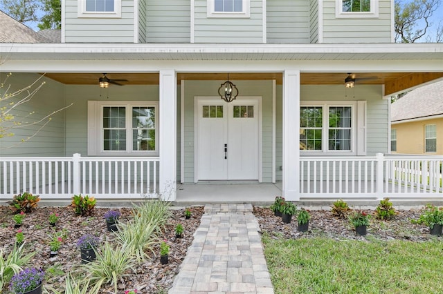 property entrance featuring a porch and ceiling fan