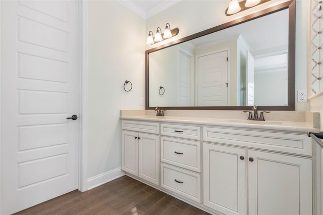 bathroom with vanity and ornamental molding