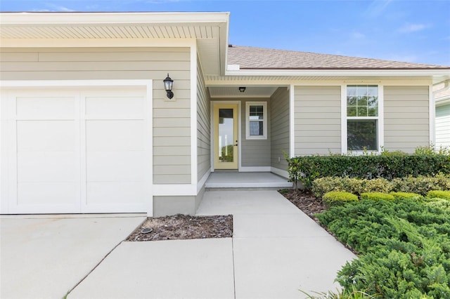 entrance to property featuring a garage