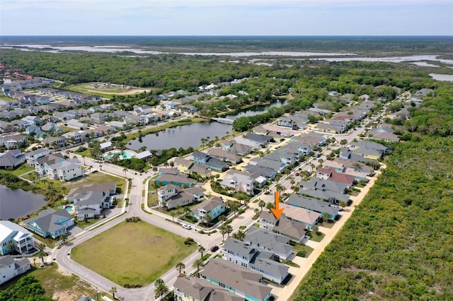 drone / aerial view with a water view