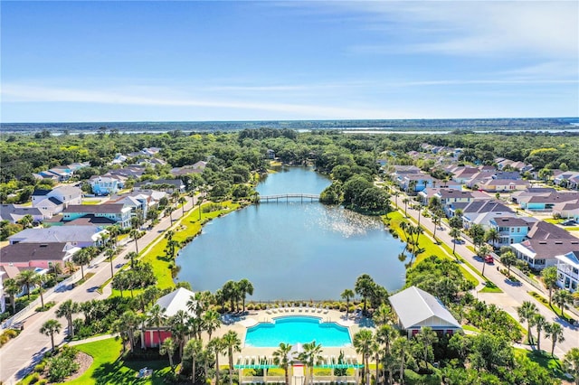 birds eye view of property featuring a water view