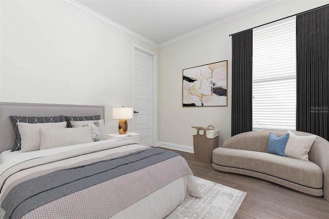 bedroom featuring crown molding