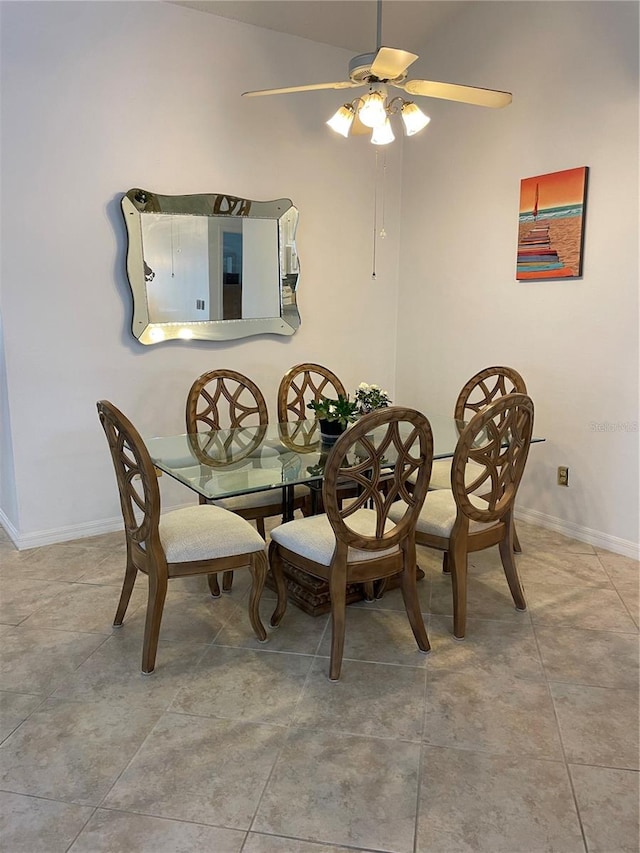 dining room featuring ceiling fan