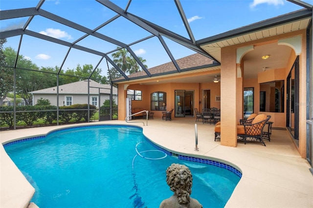 view of pool with a lanai, an outdoor hangout area, and a patio