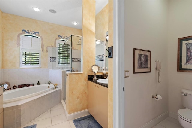 full bathroom featuring tile patterned floors, vanity, toilet, and independent shower and bath