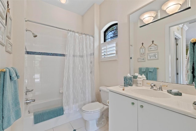 full bathroom with tile patterned flooring, vanity, shower / tub combo, and toilet