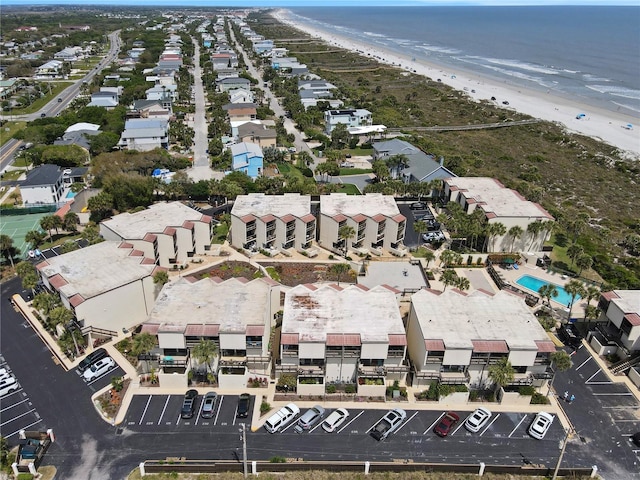 aerial view featuring a water view and a beach view