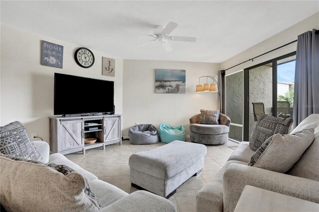 tiled living room featuring ceiling fan