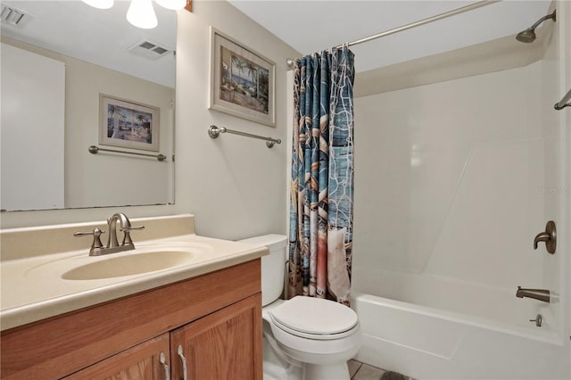 full bathroom featuring vanity, toilet, and shower / bath combo