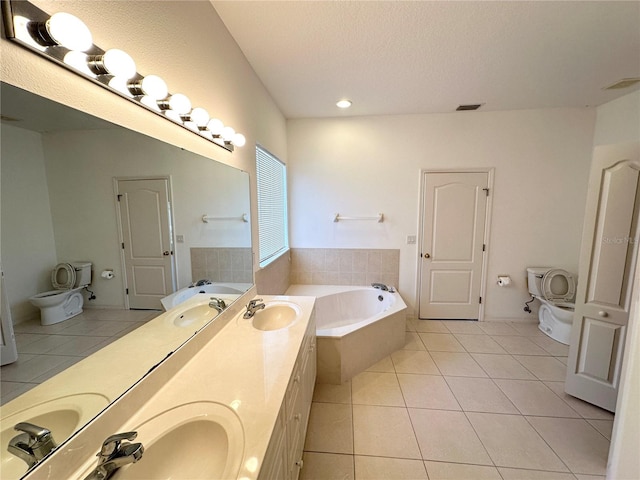 bathroom with tile flooring, dual sinks, a washtub, and oversized vanity