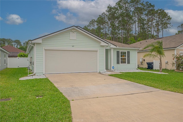 single story home with a front yard and a garage