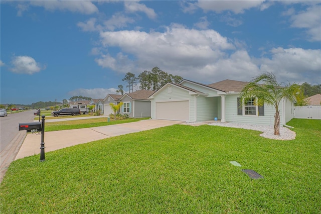 ranch-style house featuring a front yard and a garage