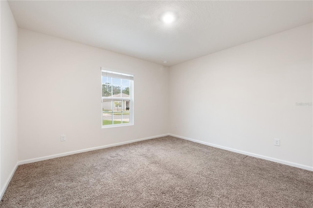 empty room with carpet floors