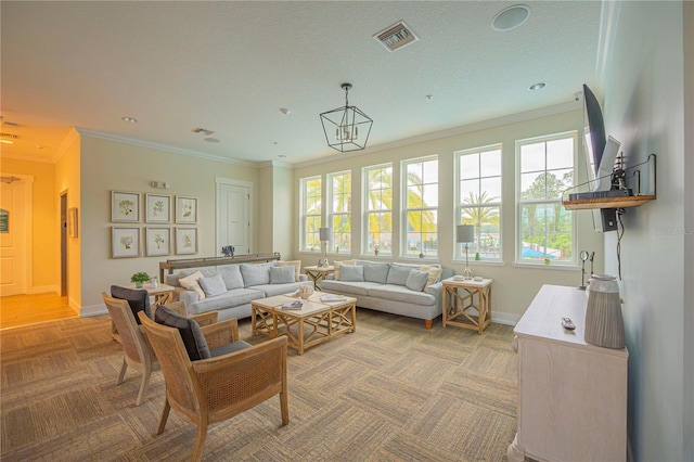 living room featuring a notable chandelier and ornamental molding