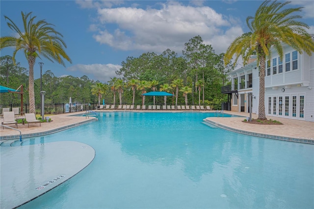 view of pool featuring a patio area