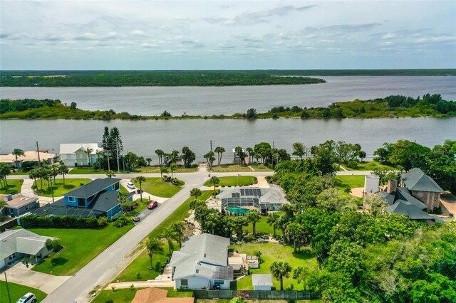 drone / aerial view with a water view