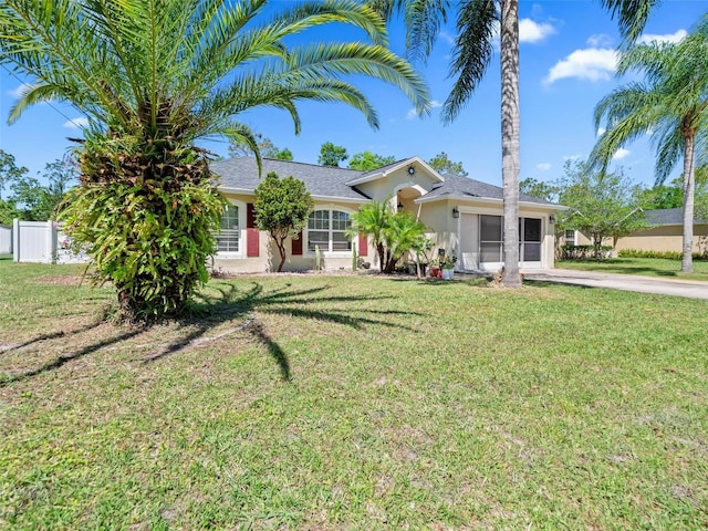 view of front of home with a front lawn