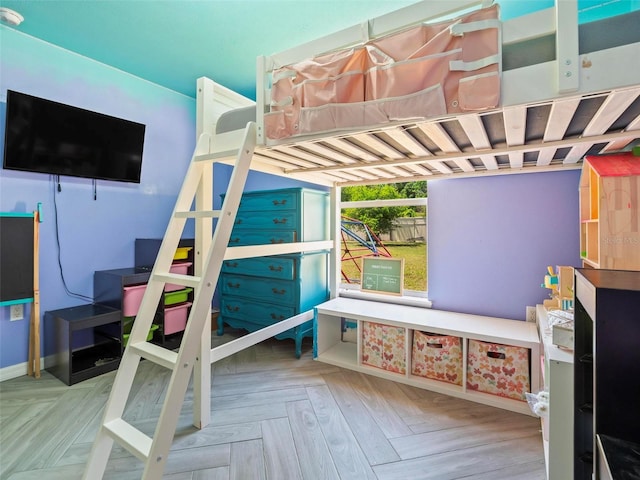 bedroom featuring light parquet floors