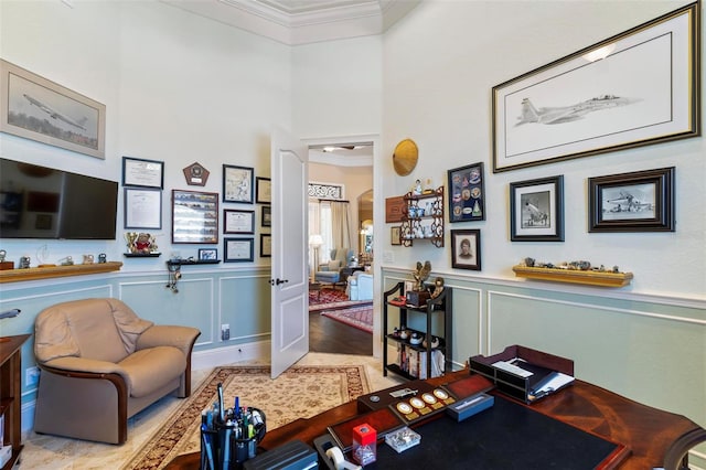 interior space with light hardwood / wood-style flooring and ornamental molding